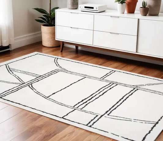 Ivory And Black Geometric Area Rug